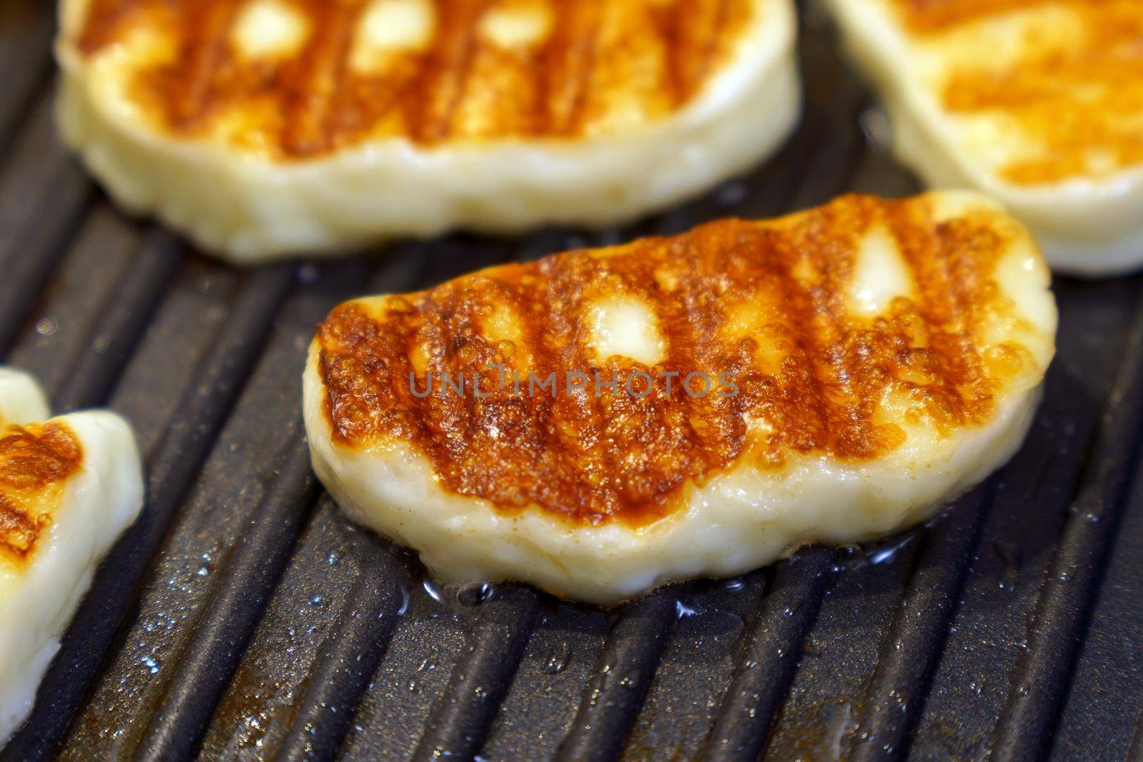 Traditional Greek Grilled Hallumi Cheese it can be fried or grilled. by darksoul72