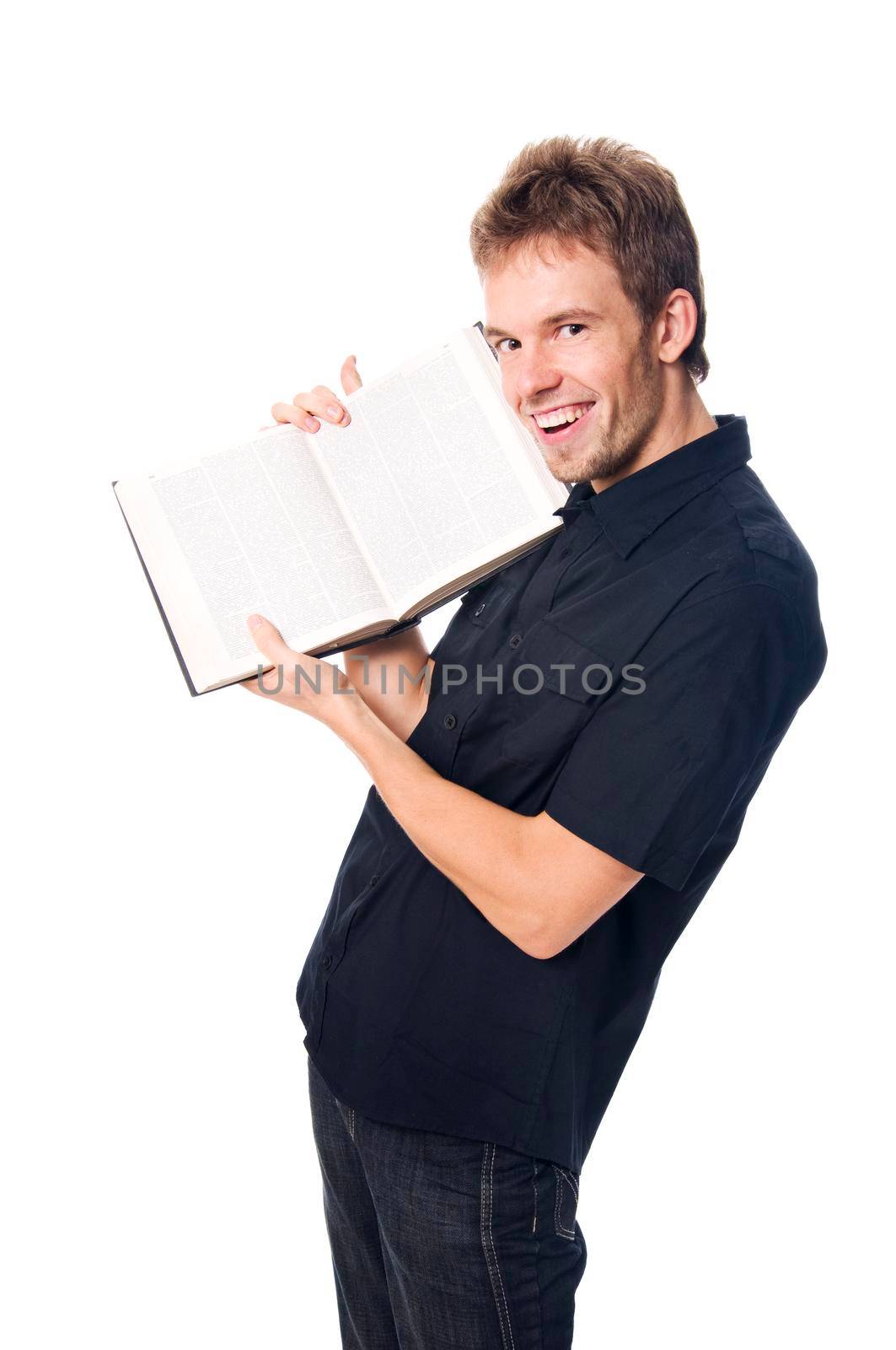 Young man isolated on white with open book