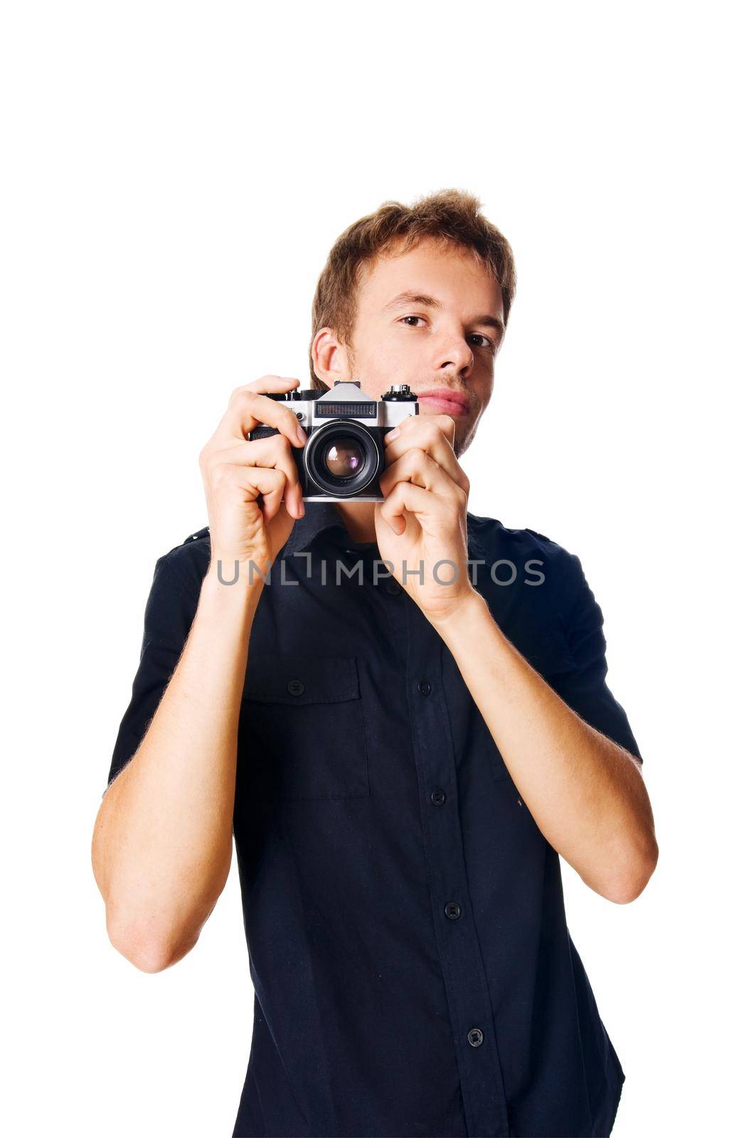 Young man with camera isolated on white background