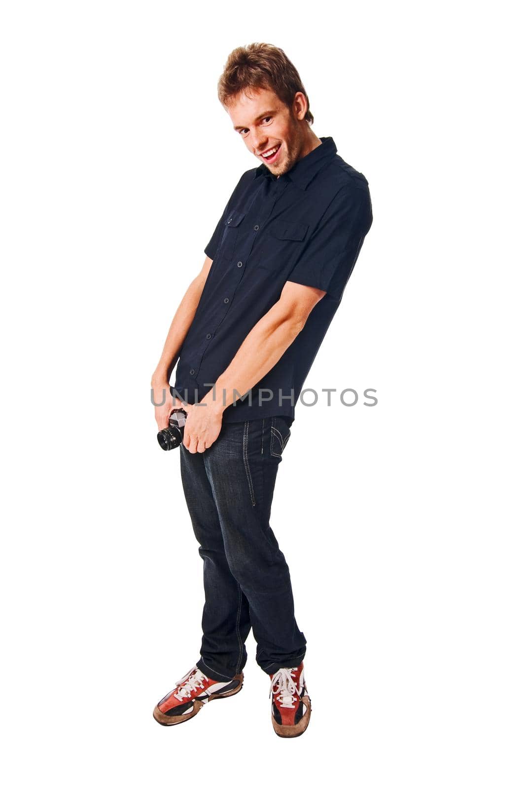 Attractive young man with camera isolated on white