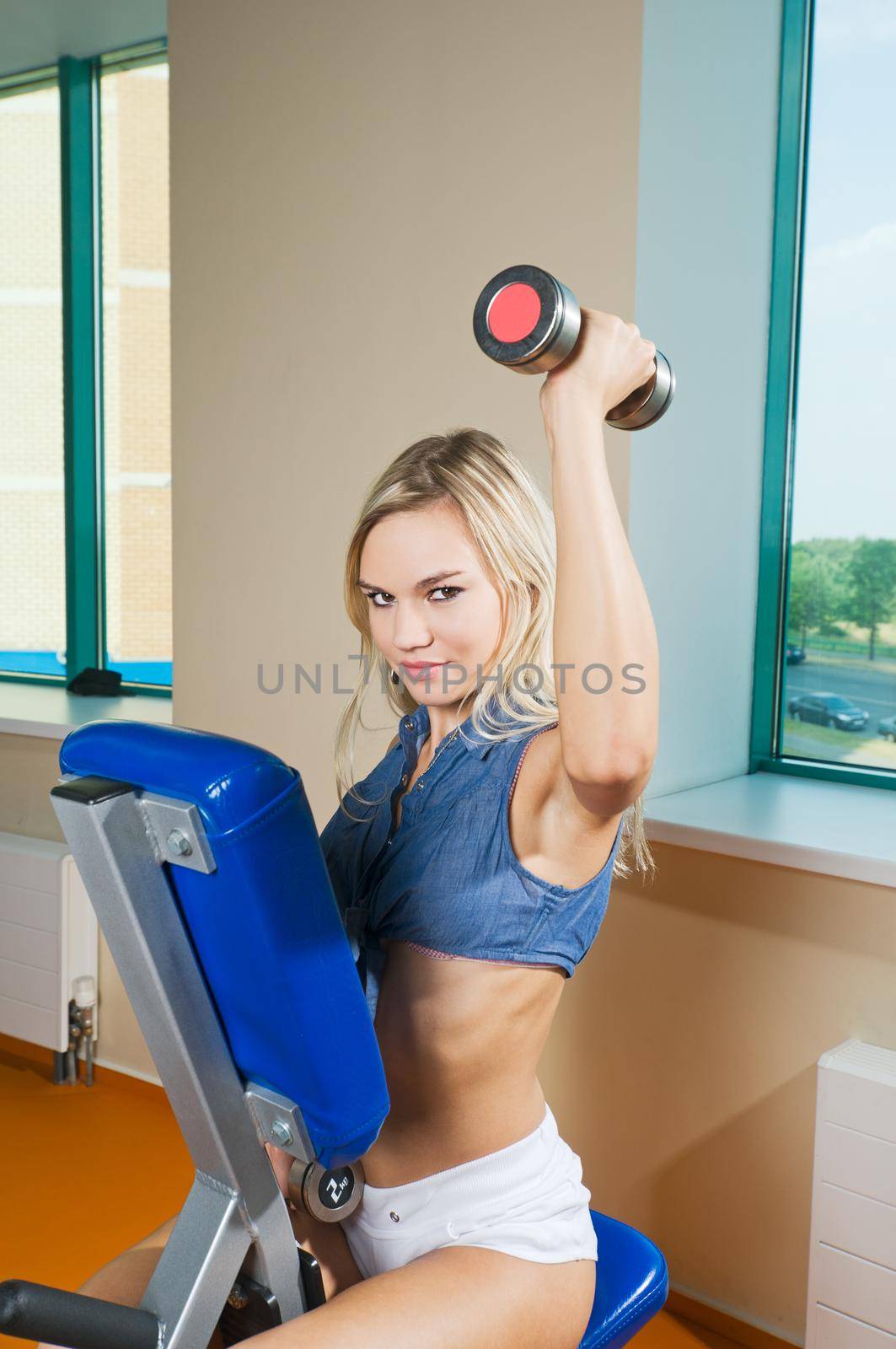 Beautiful blond girl at the health club