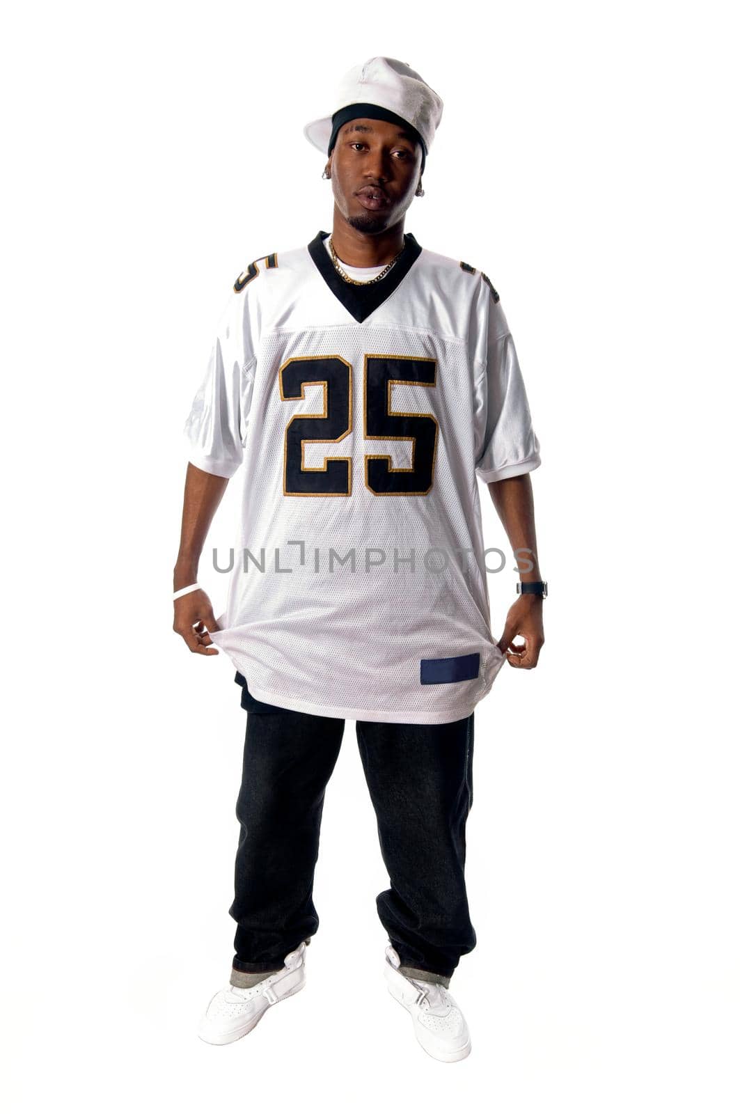 Cool young hip-hop dancer on white background
