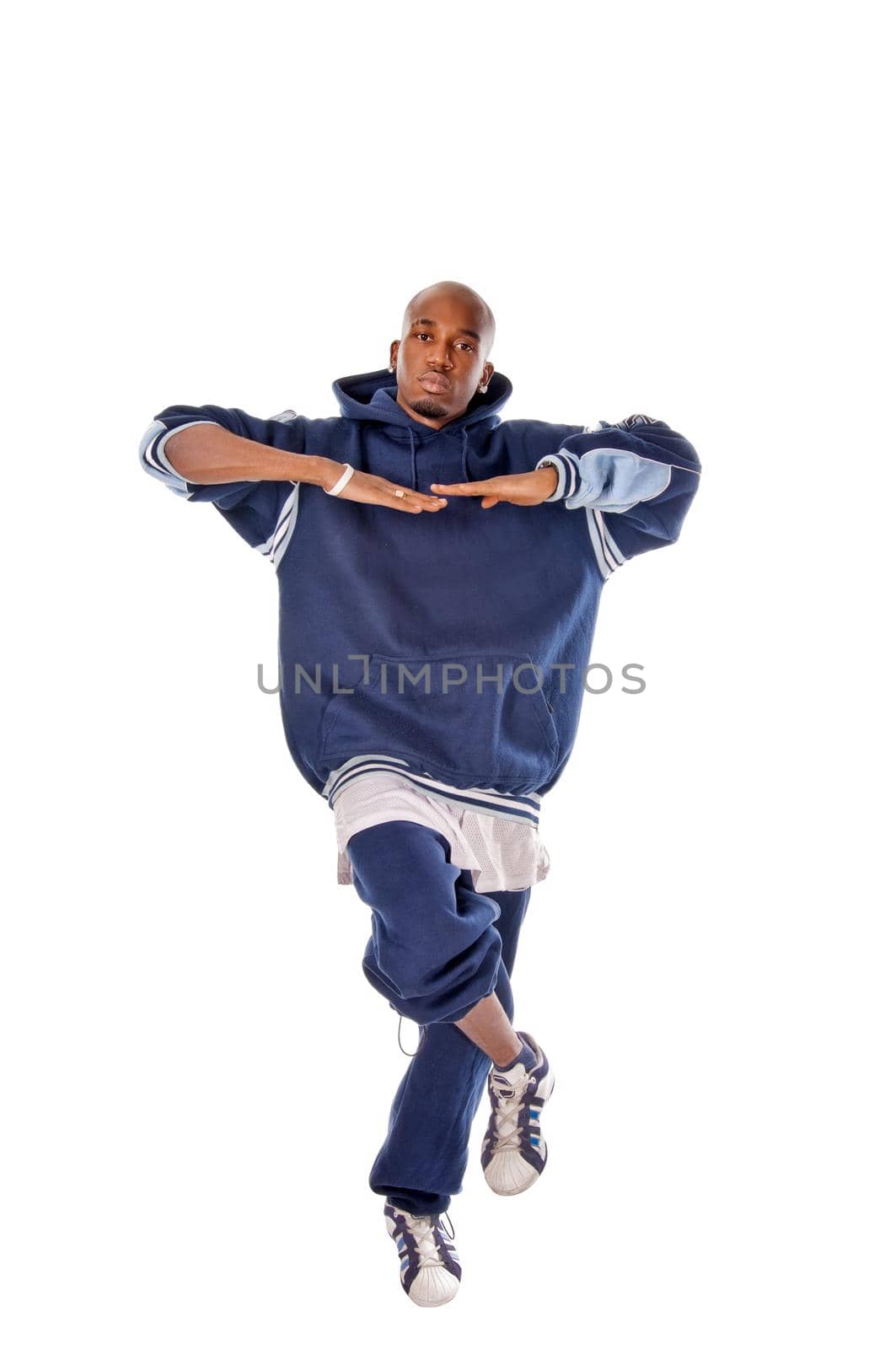 Cool young hip-hop dancer on white background