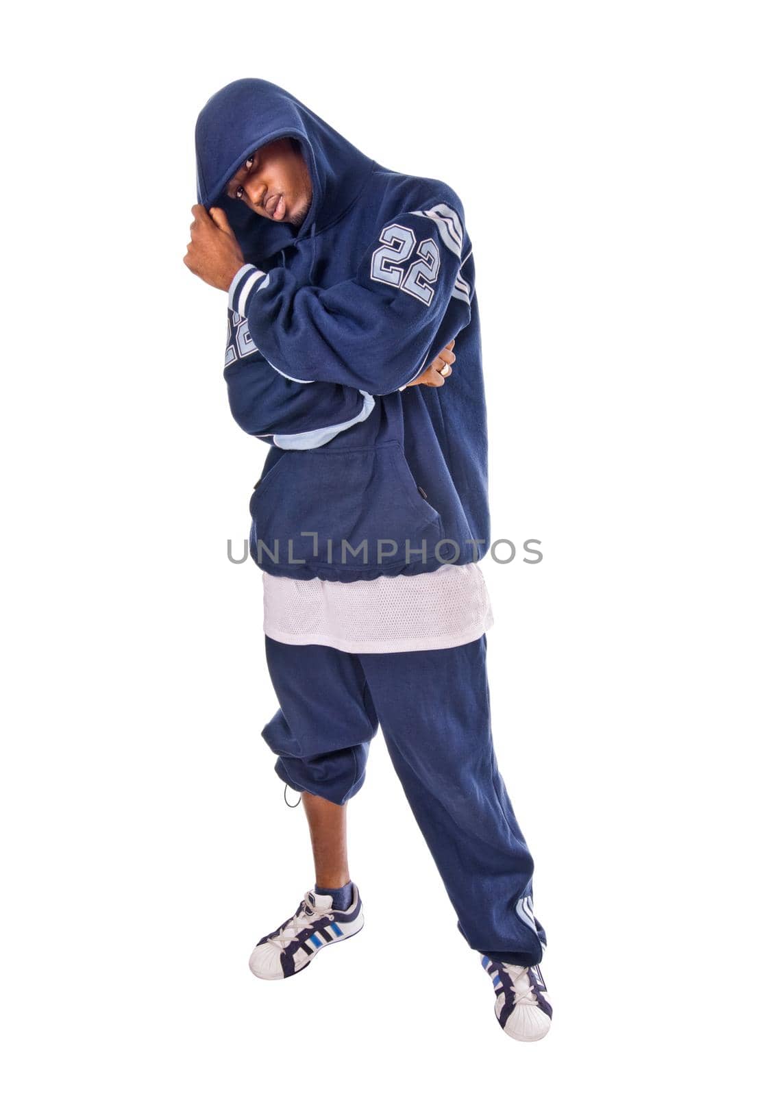 Cool young hip-hop dancer on white background
