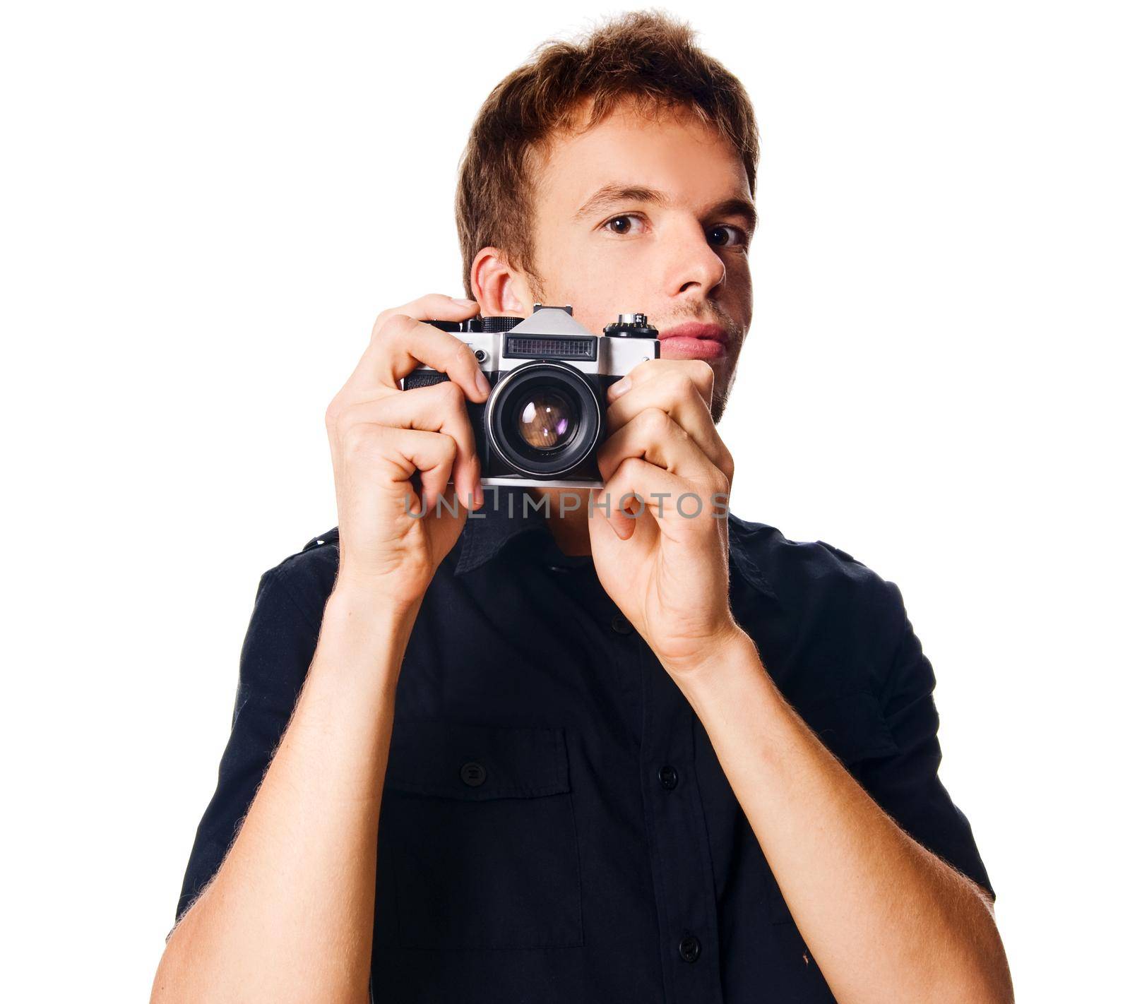 Young man with camera isolated on white background
