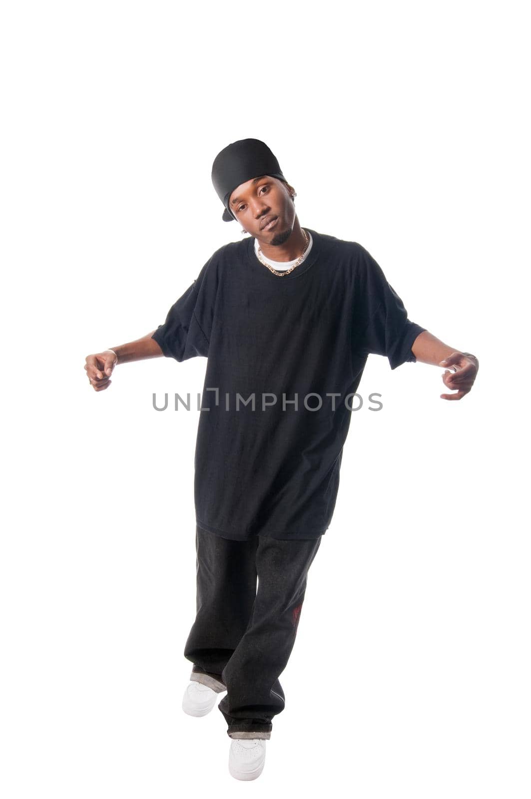 Cool young hip-hop dancer making a move