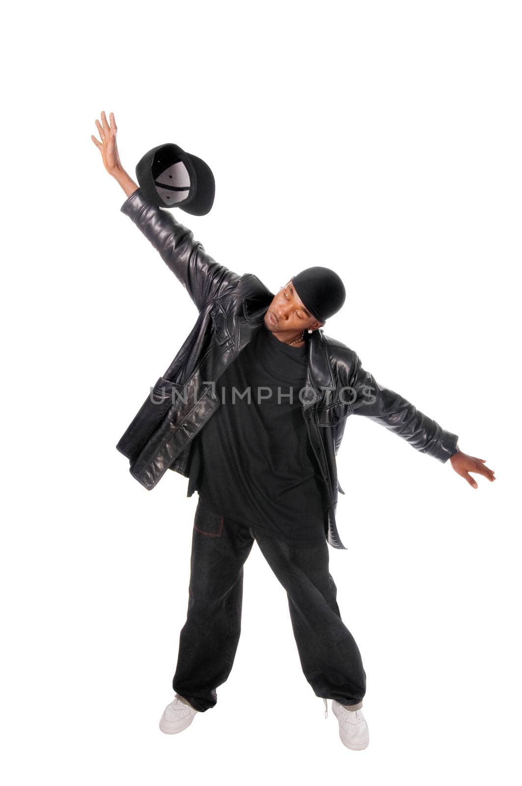 Cool young hip-hop dancer on white background