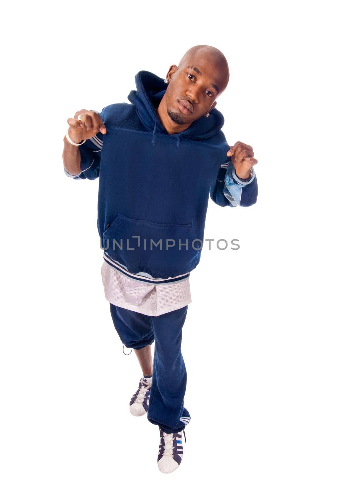 Cool young hip-hop dancer on white background