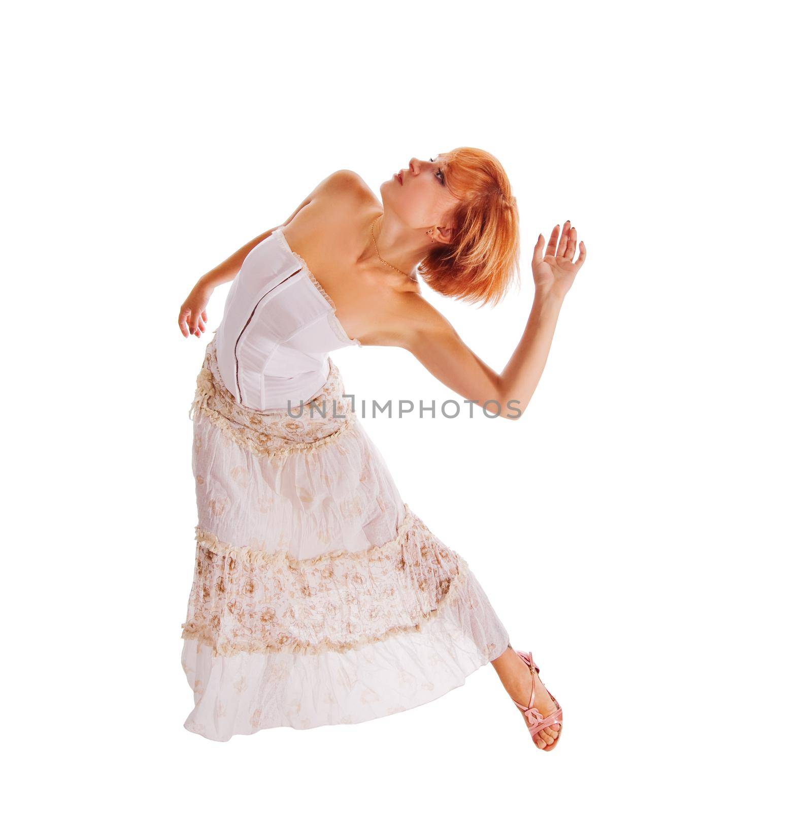 Beautiful red-haired dancer isolated on white background