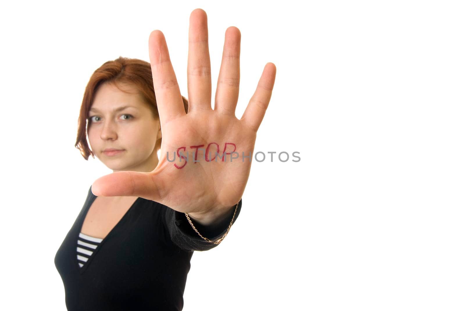 Girl showing "Stop!" gesture with her hand