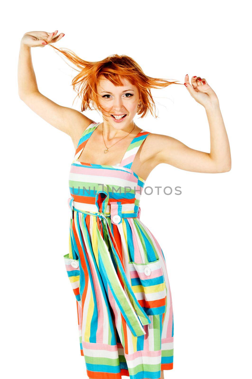Beautiful red girl wearing colorful dress isolated on white