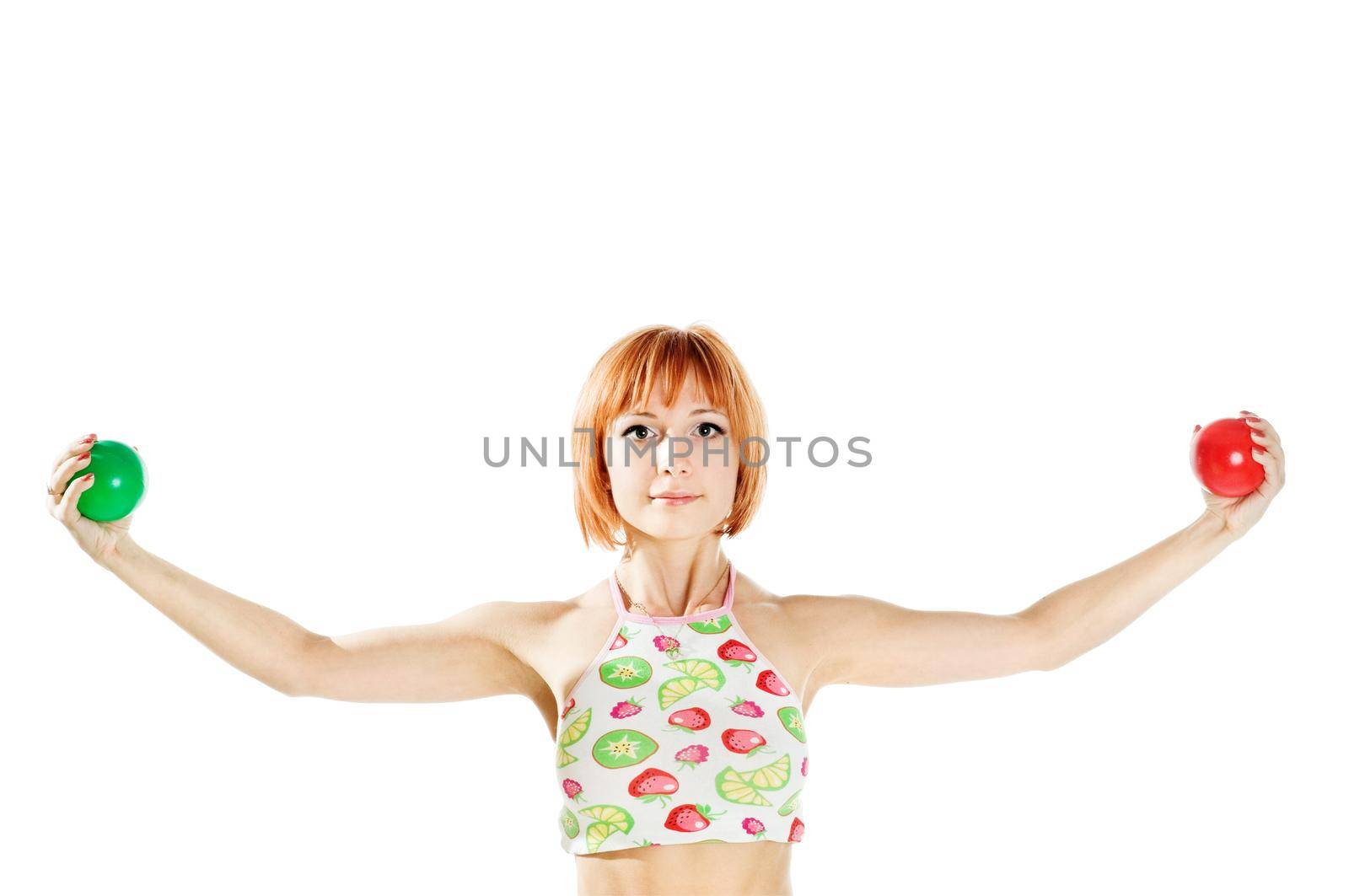 Young red-haired fitness girl isolated on white background