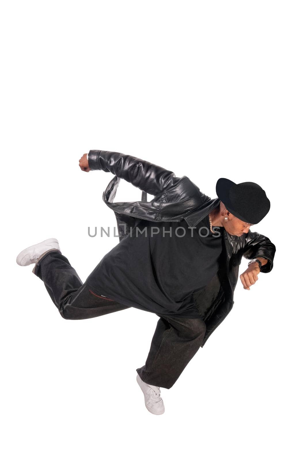 Cool young hip-hop dancer on white background