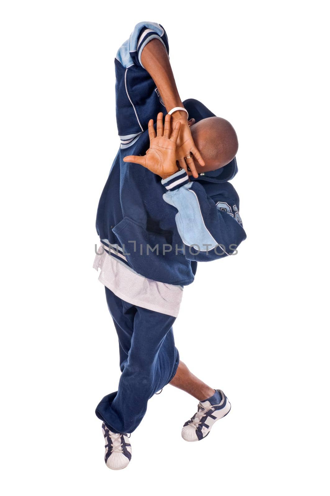 Cool young hip-hop dancer on white background