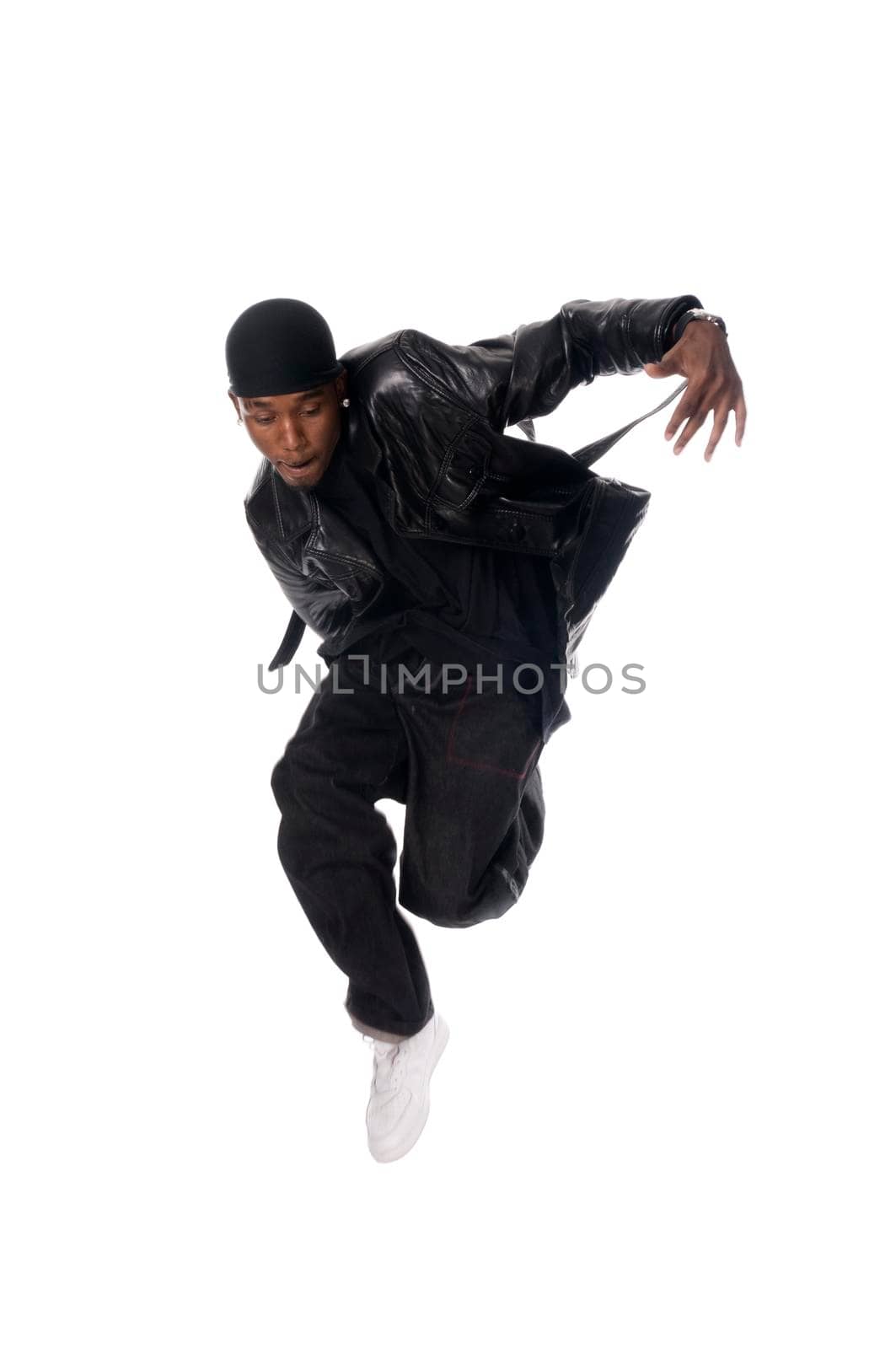 Cool young hip-hop dancer on white background