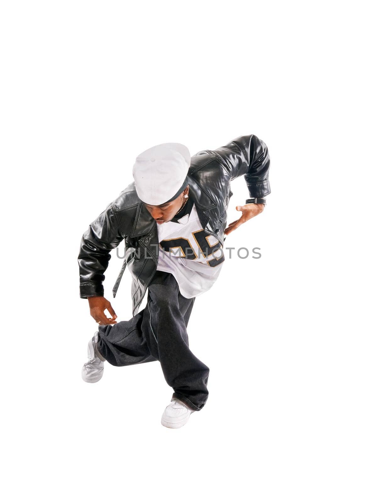 Cool young hip-hop dancer on white background