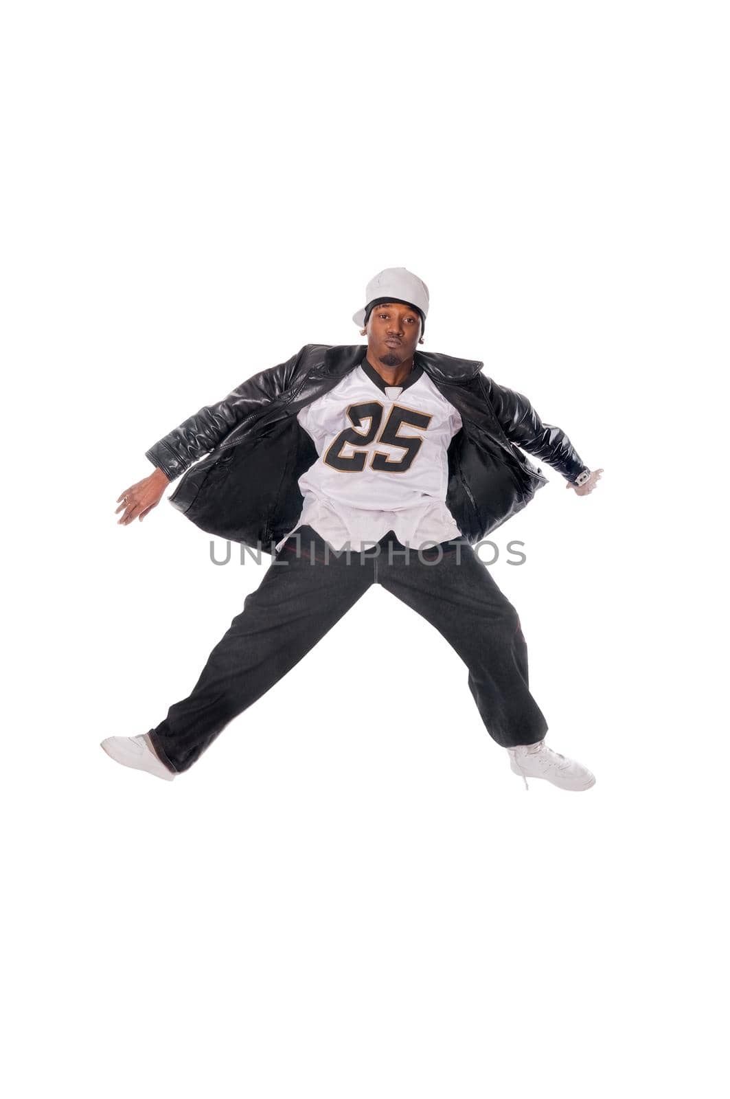 Cool young hip-hop dancer on white background
