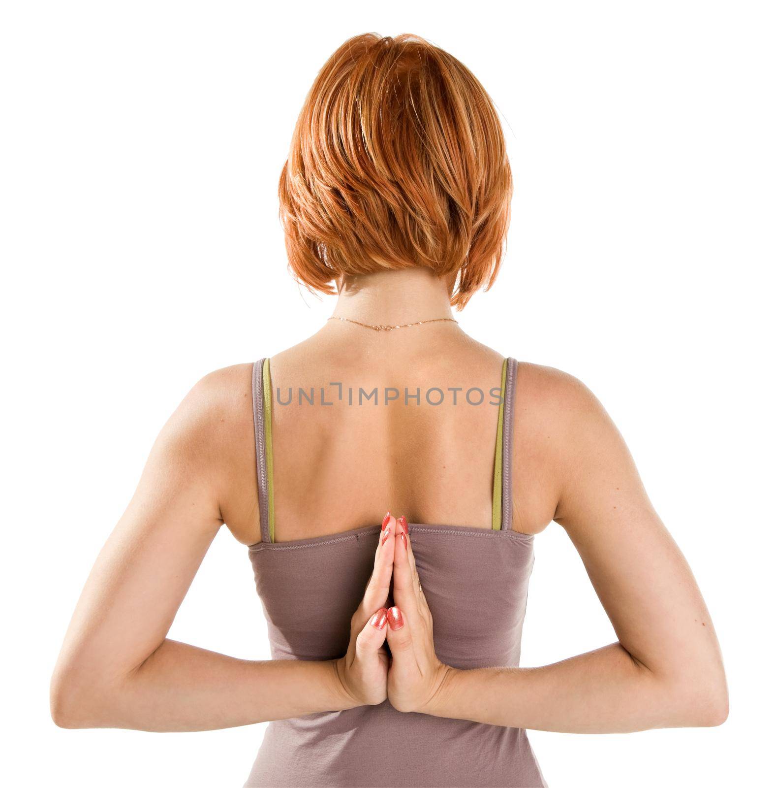 Red-haired girl practicing yoga isolated on white background