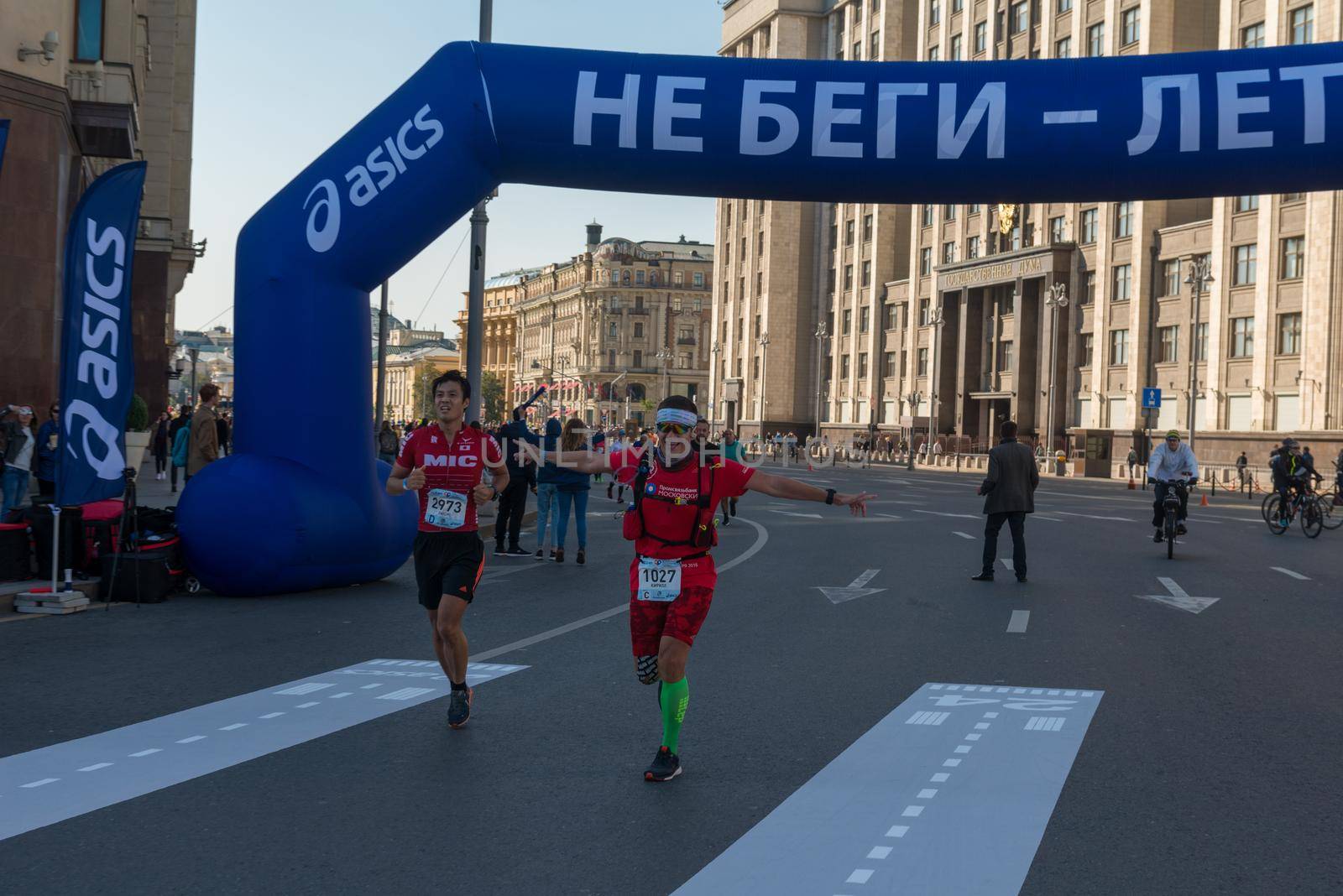 Moscow - September 24, 2017: Participants of Moscow autumn marathon sponsored by Asics brand