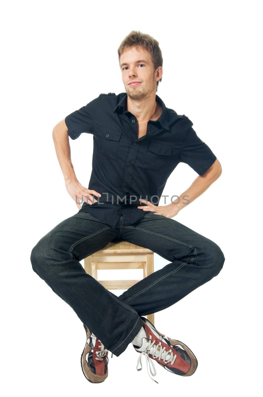 Young man standing isolated on white background