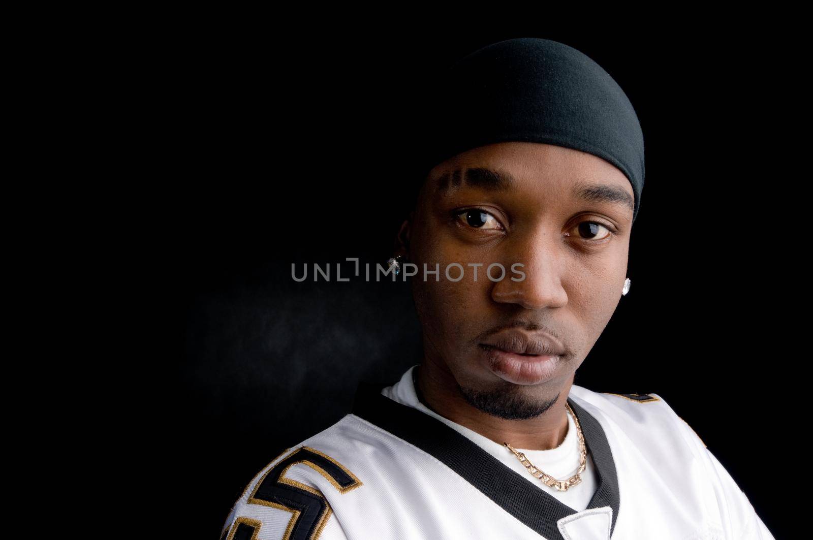 Hip-hop singer and dancer over black background