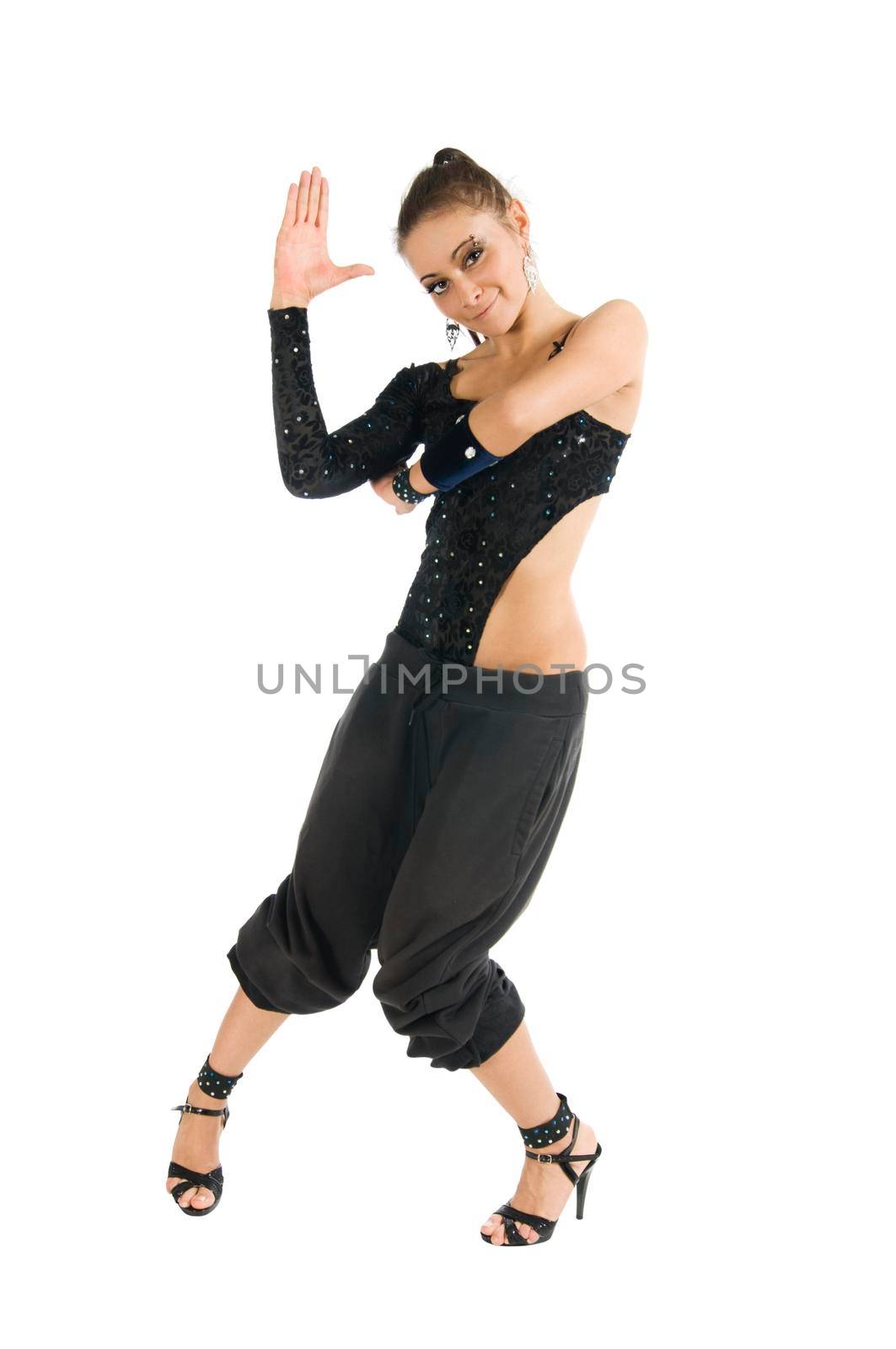 Beautiful modern dancer wearing black clothes dancing on white
