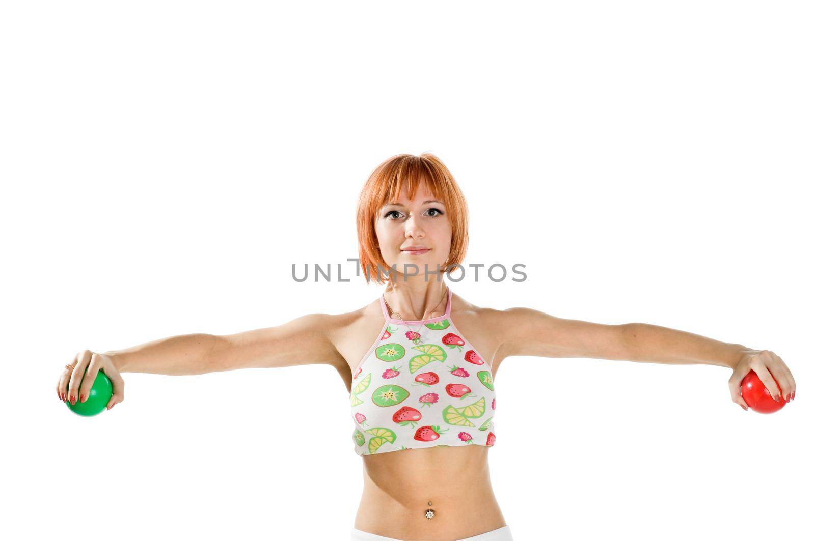 Young red-haired fitness girl isolated on white background