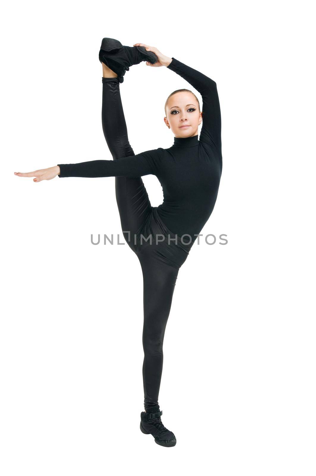 Beautiful modern dancer showcasing her agility on white