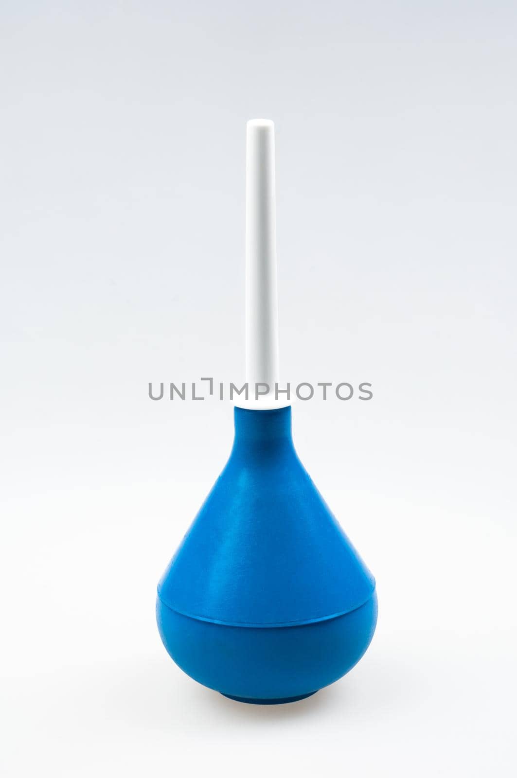 Enema (clyster) on white background with soft shadow