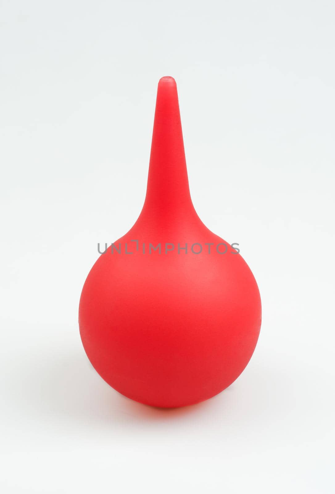 Enema (clyster) on white background with soft shadow