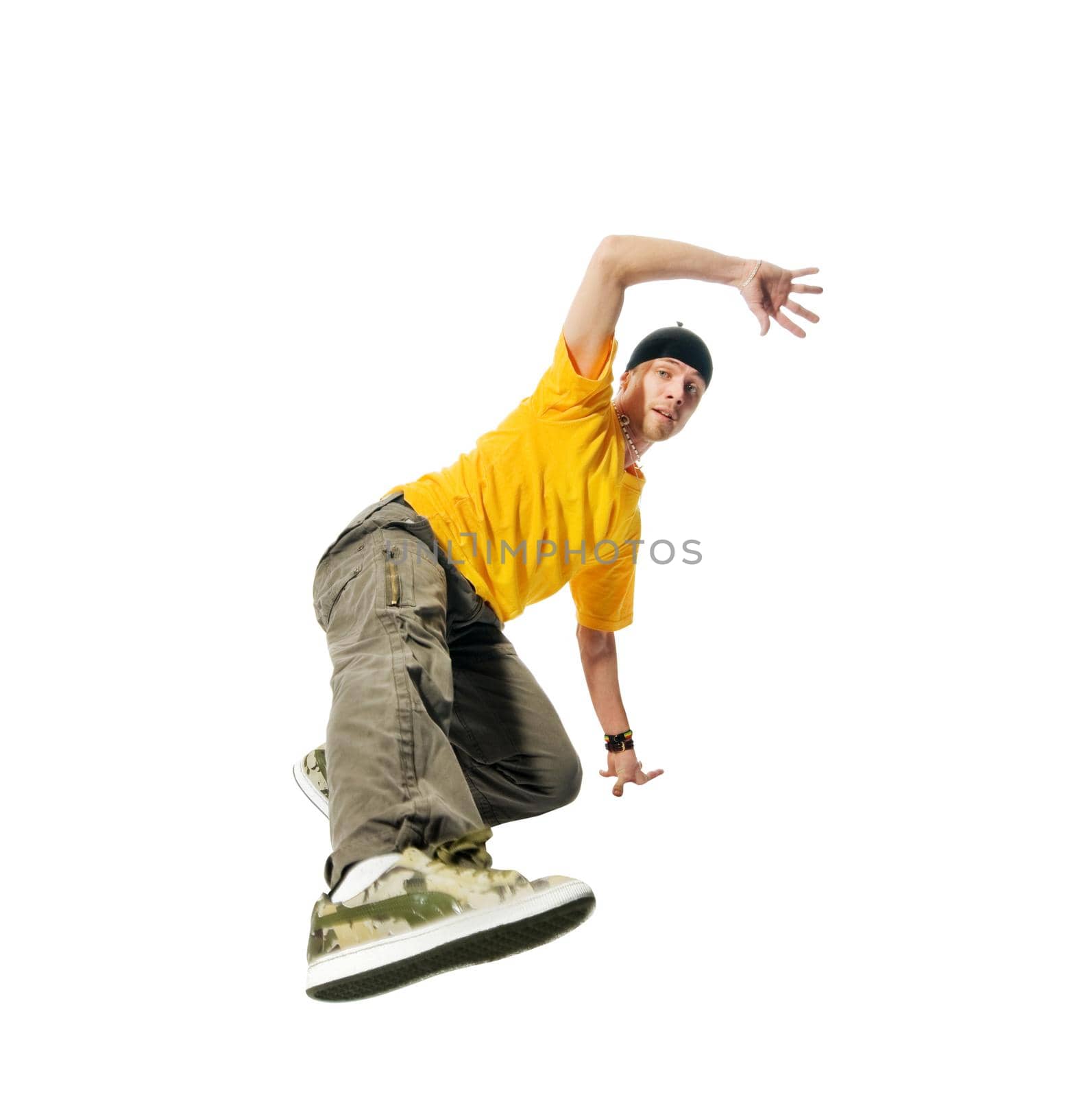 Cool young hip-hop dancer on white background