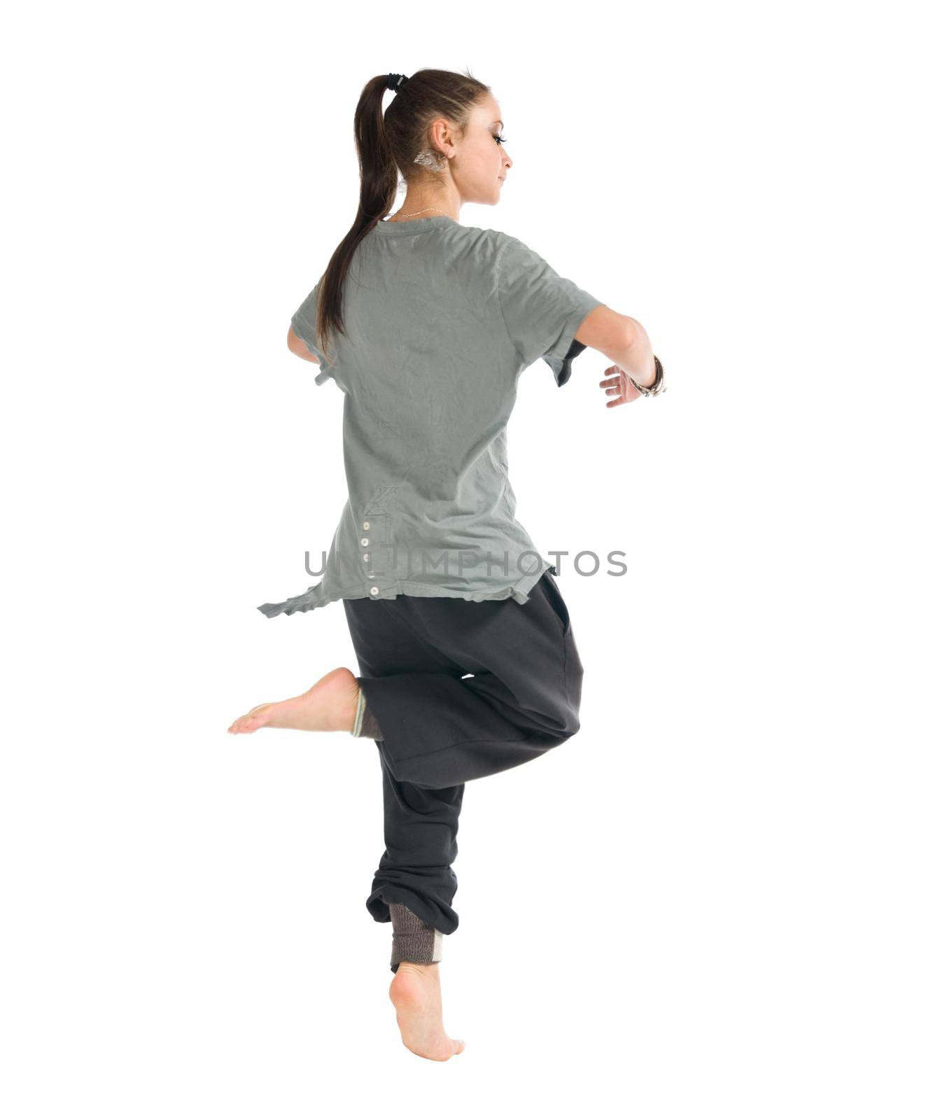 Beautiful contemporary dancer performing on white background.