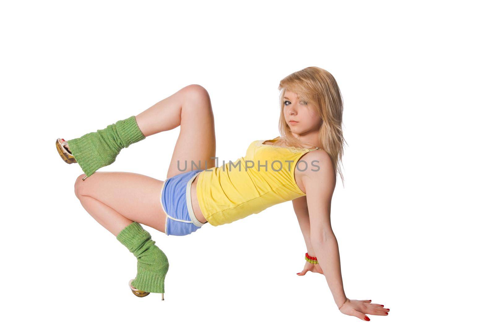 Beautiful fit girl exercising isolated on white background