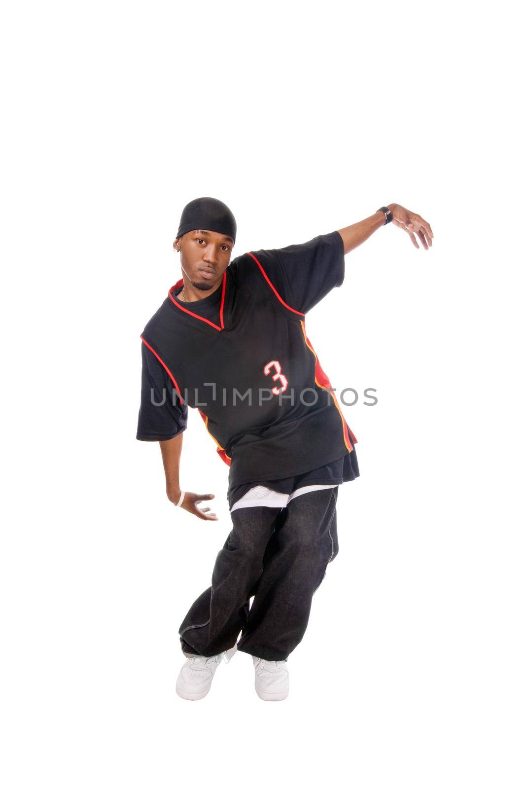 Cool young hip-hop dancer on white background