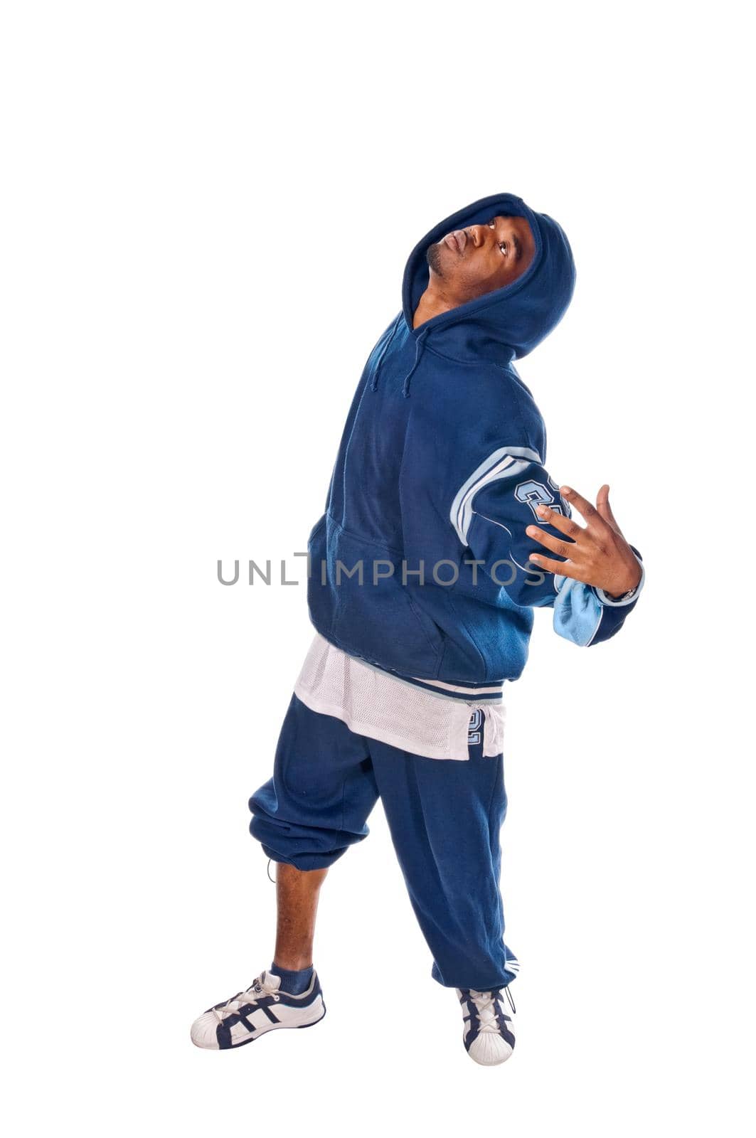 Cool young hip-hop dancer on white background