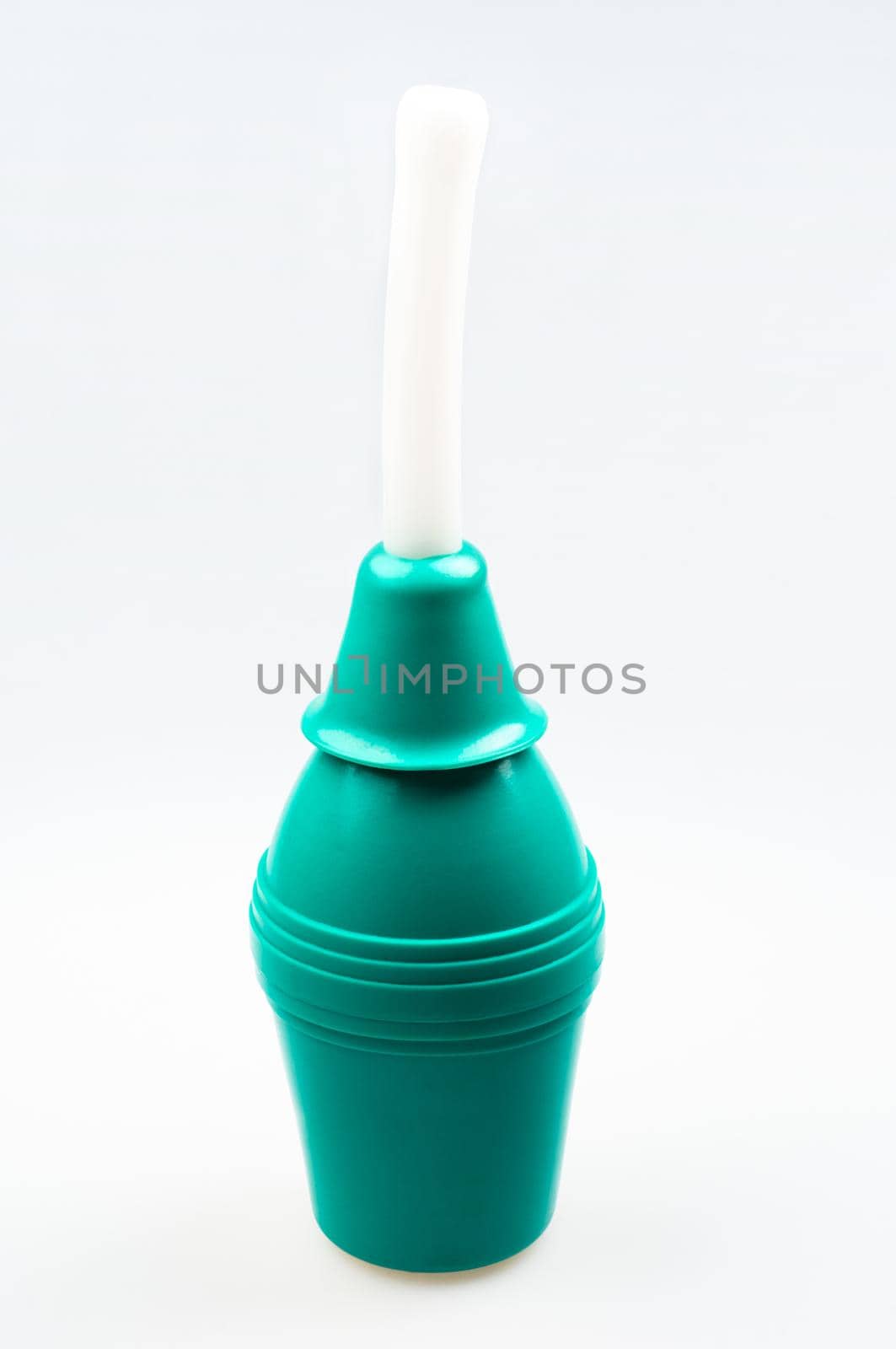 Enema (clyster) on white background with soft shadow