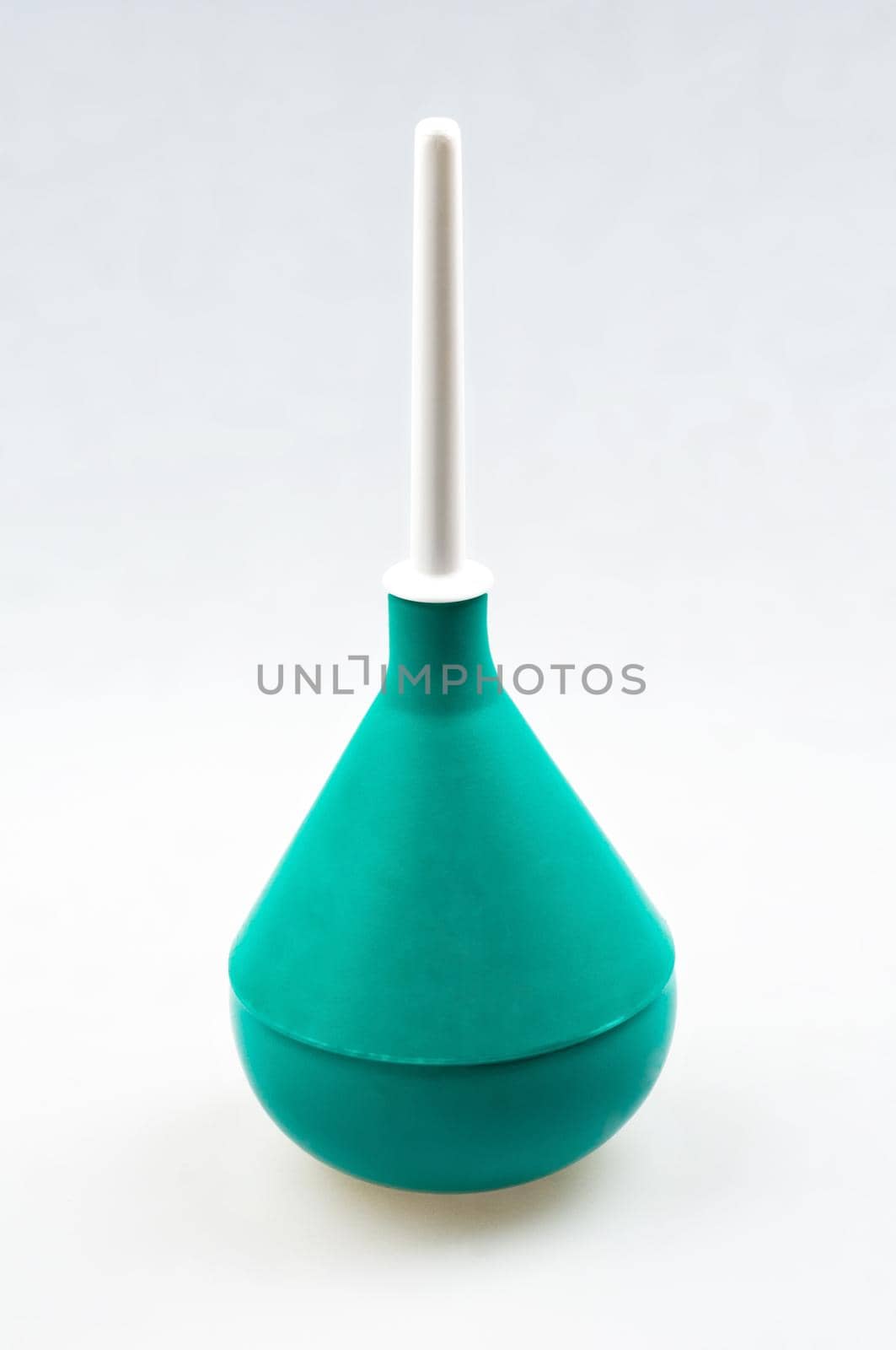 Enema (clyster) on white background with soft shadow