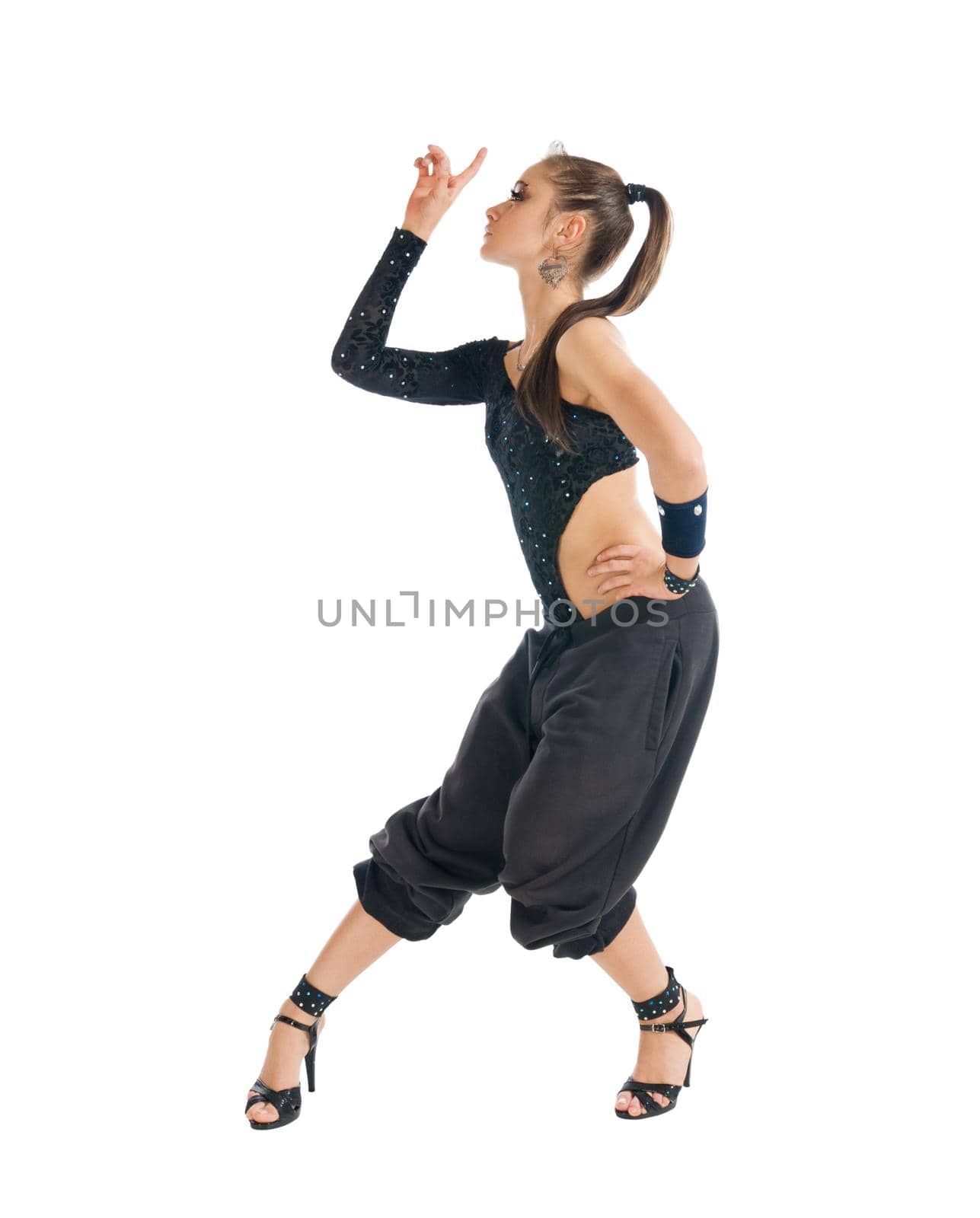 Beautiful modern dancer wearing high heels on white