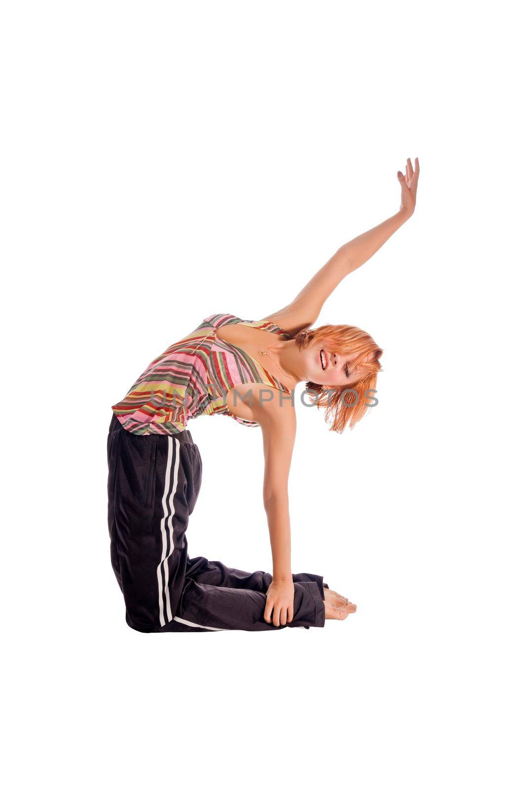 Red haired girl performing fitness exercises on white background