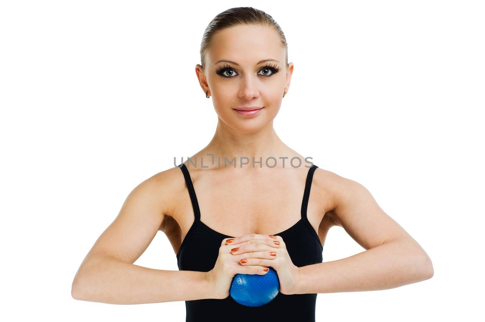 Beautiful fit red girl working out with blue ball