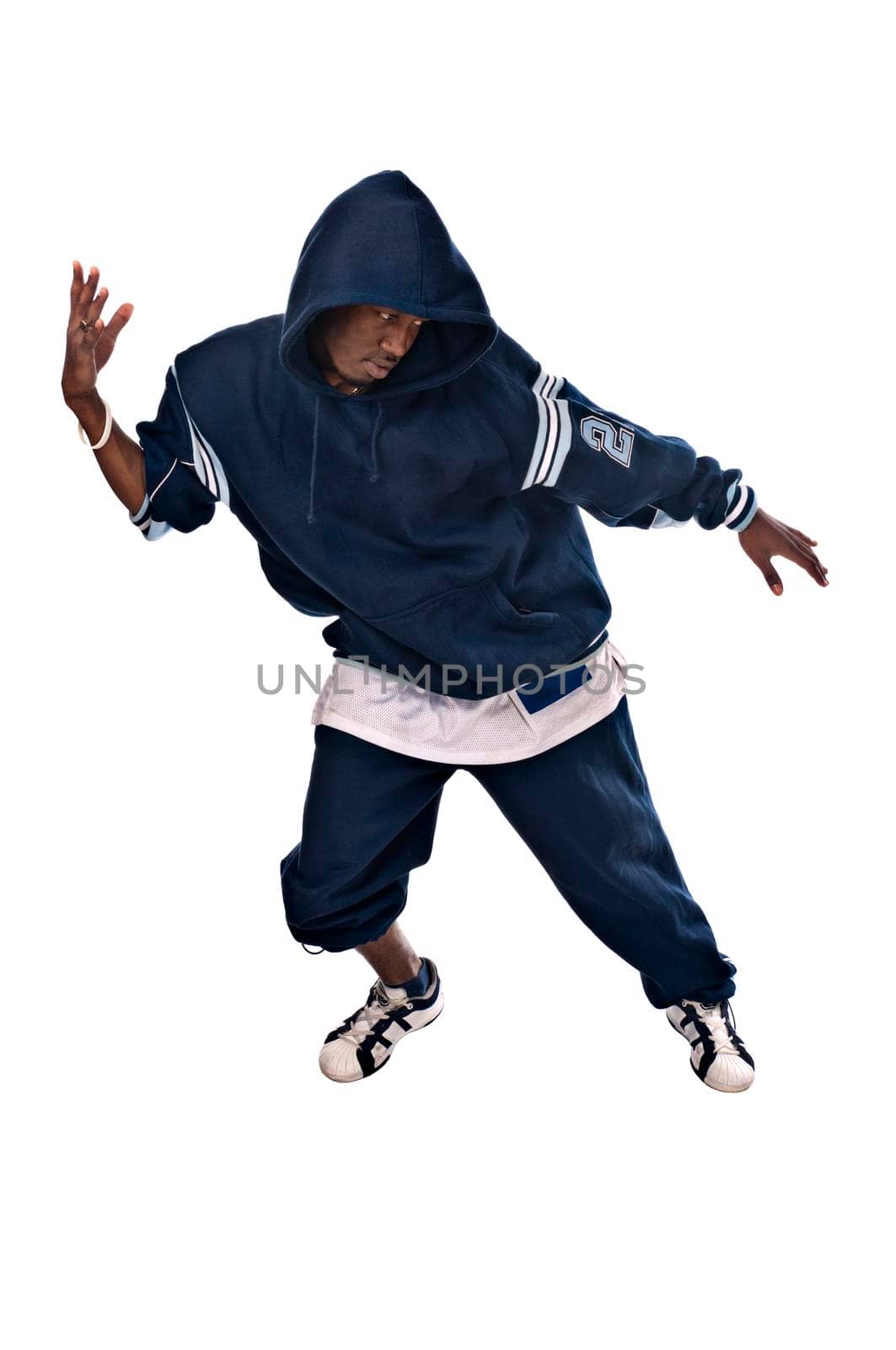 Cool young hip-hop dancer on white background