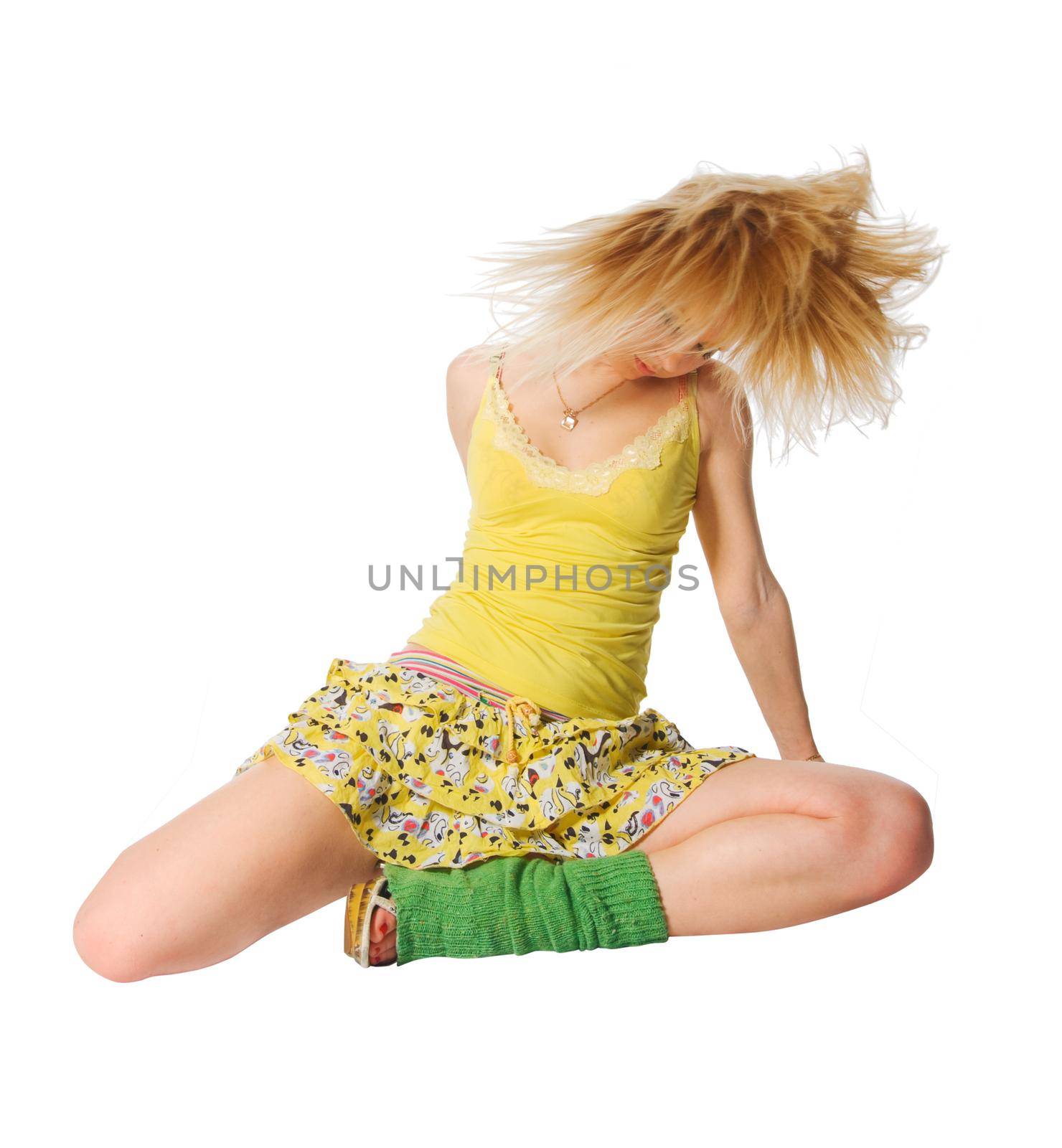 Beautiful dancer wearing yellow dress isolated on white