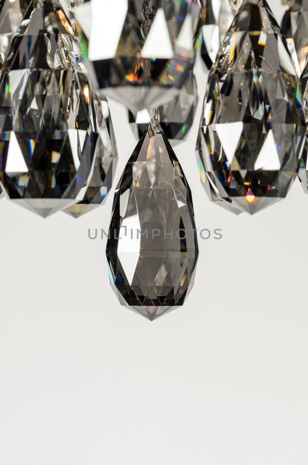 Contemporary glass chandelier crystals closeup by nikitabuida