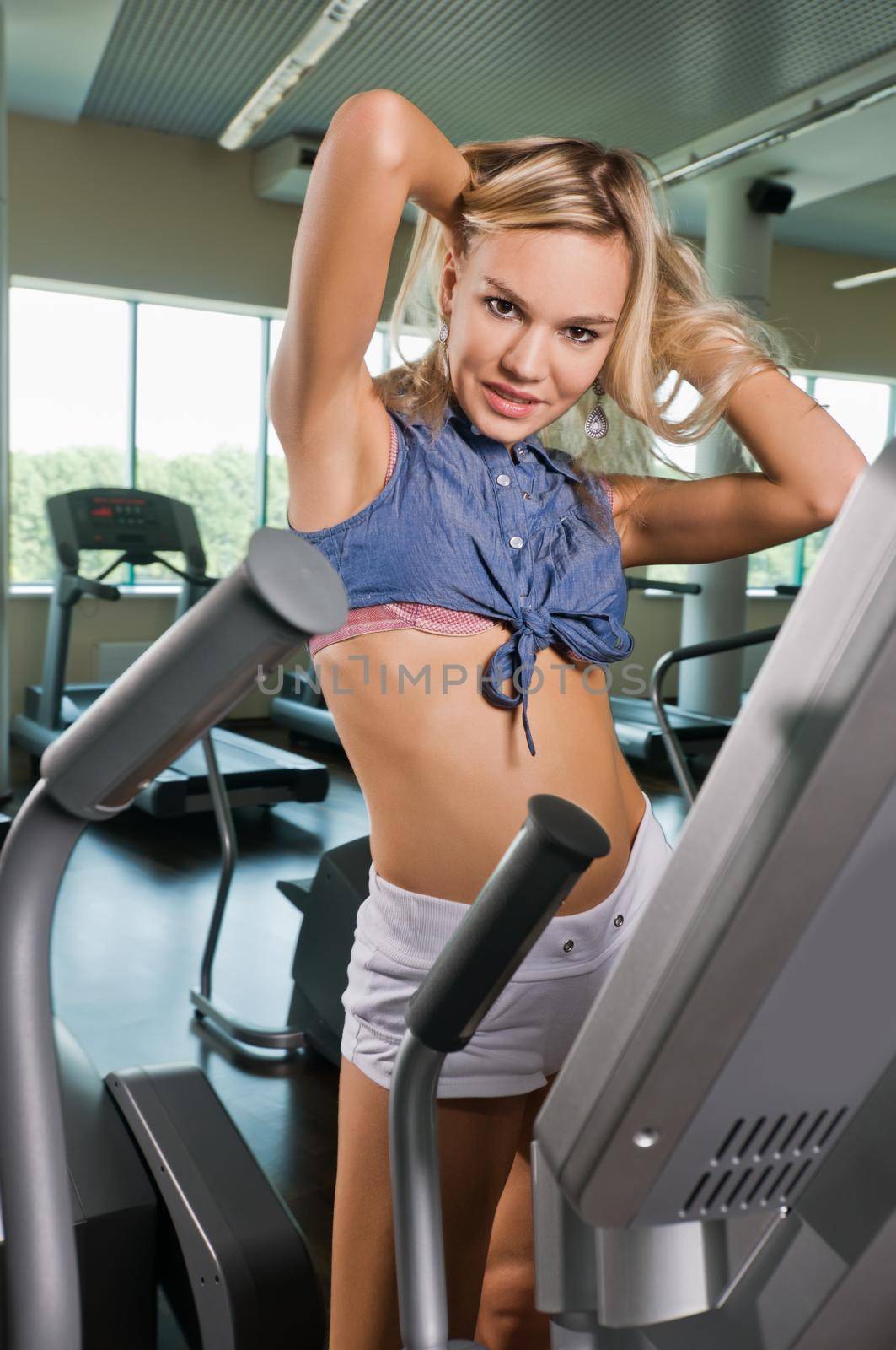 Beautiful blond girl at the health club