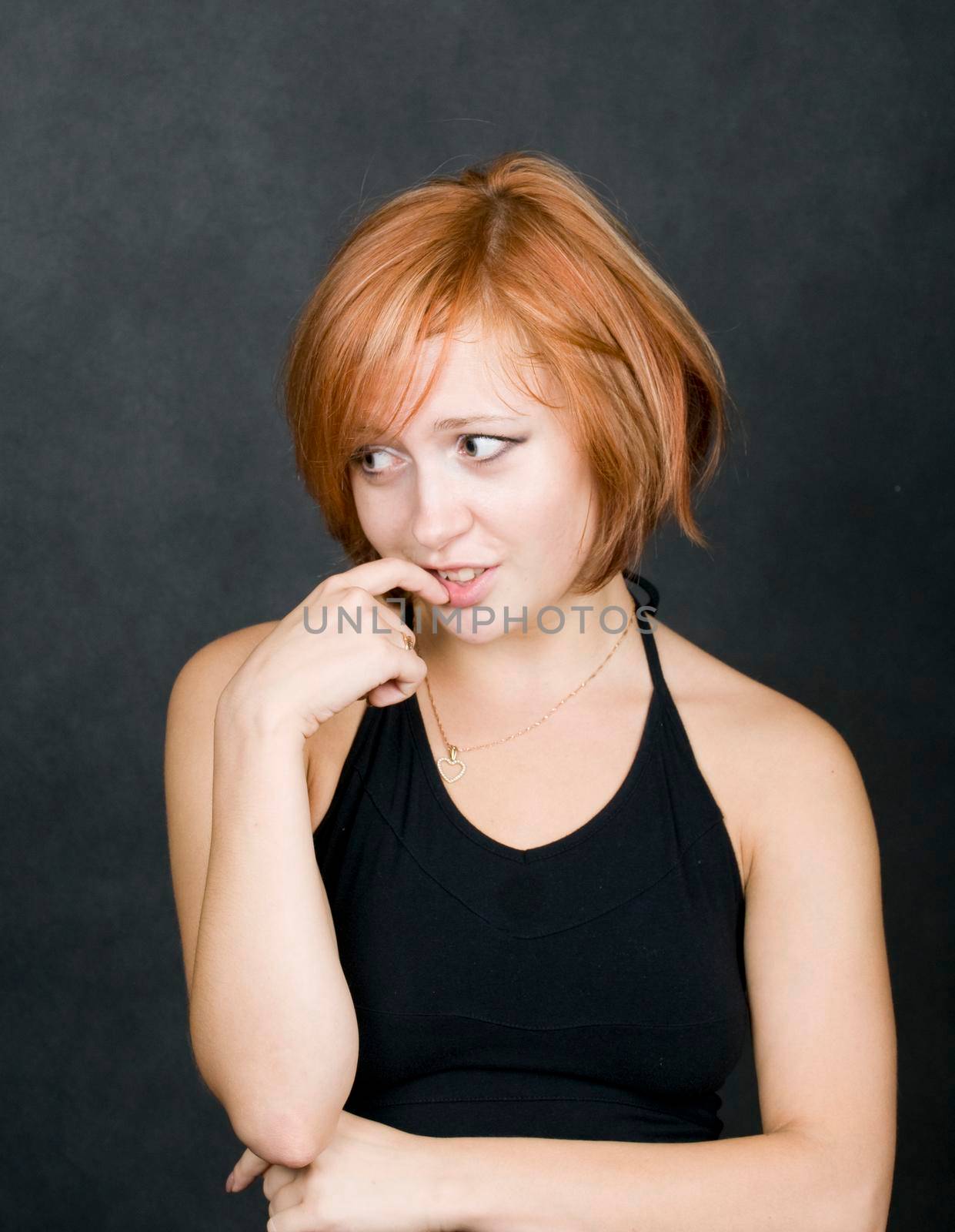 Portrait of a beautiful red haired girl.