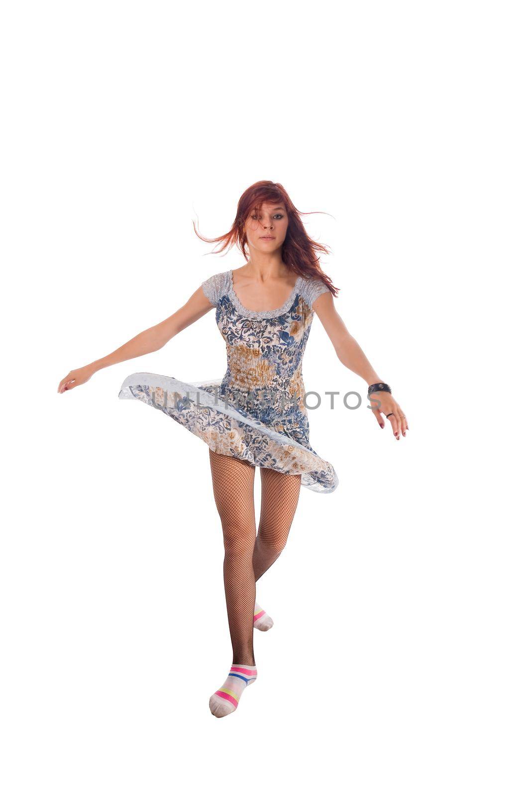 Red haired dancer isolated on white background