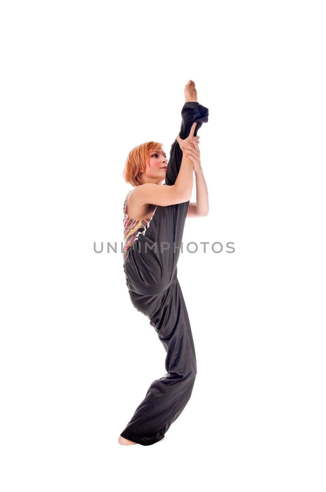 Red haired girl performing fitness exercises on white background