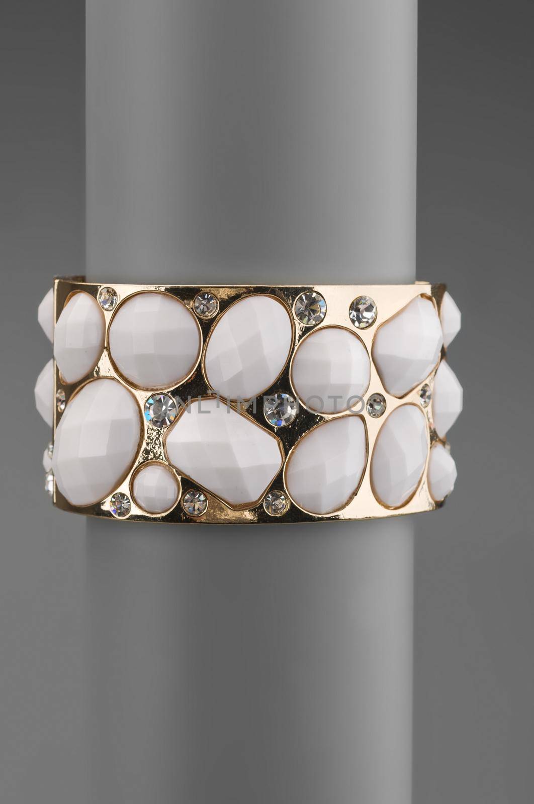 Beautiful fashion jewellery bracelet on gray background