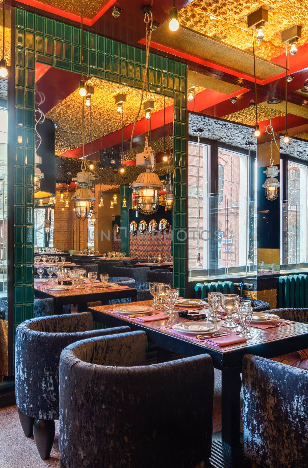 Moscow - Circa 2011: Restaurant interior with large mirror near window