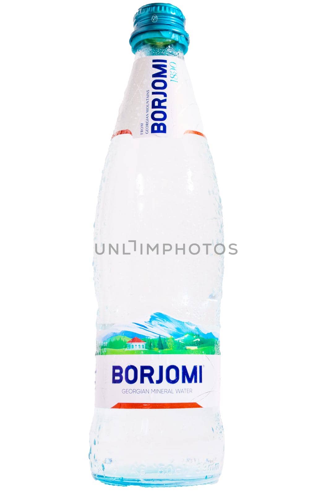 Tyumen, Russia-May 25, 2021: Borjomi is mineral water in glass bottles a close up. isolated on white by darksoul72